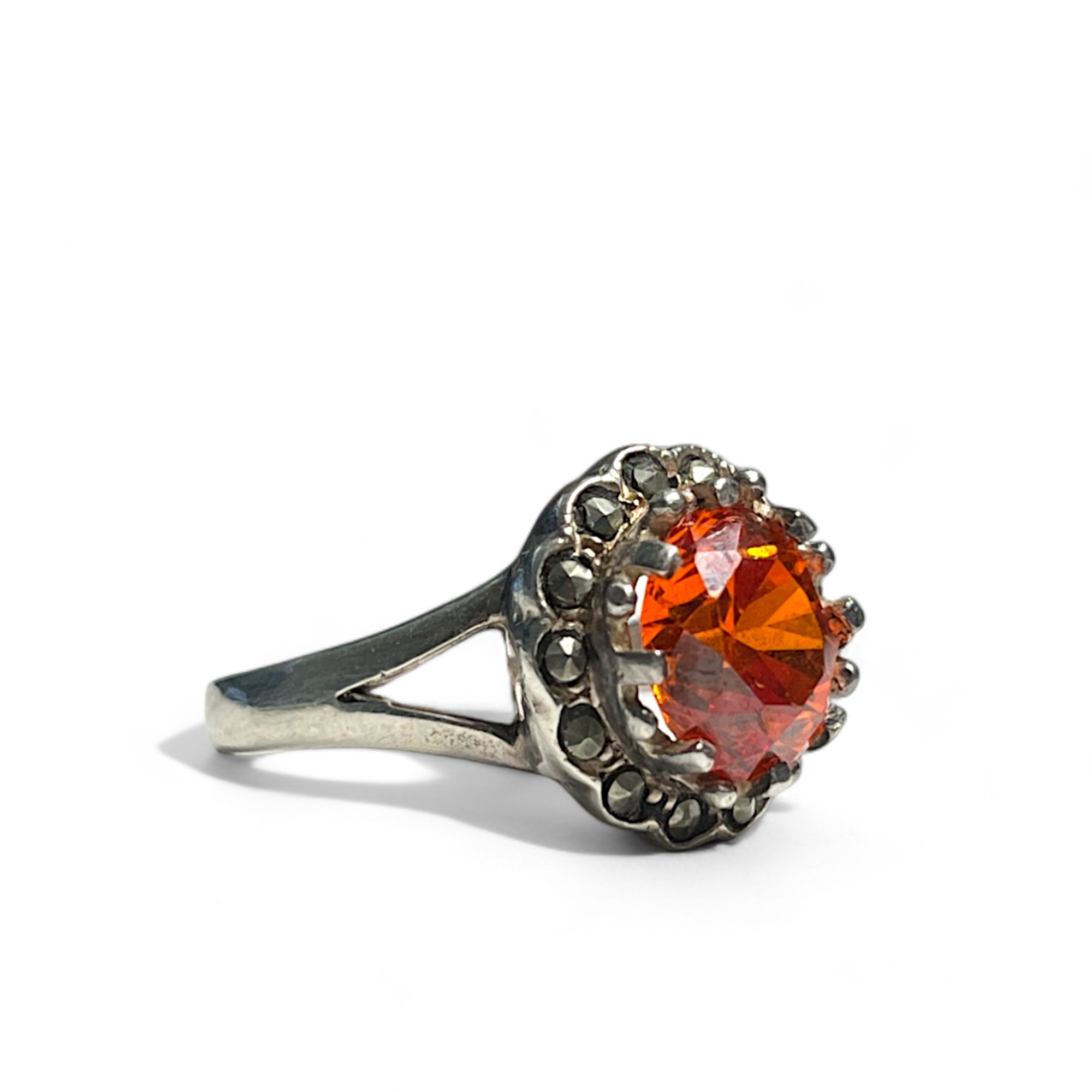 A silver, Marcasite and orange stone set ladies ring. Stamped S925.  - Image 2 of 3