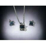 A Silver & blue Topaz pendant necklace and earrings set. Total of 5.14cts. 