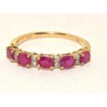 9ct gold ladies Diamond and Ruby 1/2 eternity ring hall marked diamond in ring size P 