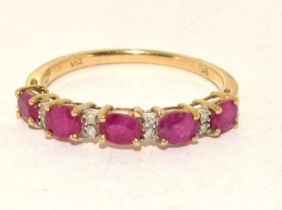 9ct gold ladies Diamond and Ruby 1/2 eternity ring hall marked diamond in ring size P