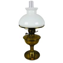 Antique Brass Large oil lamp with Glass Flue and White Glass Shade. Height 56cm to Top of Flue.