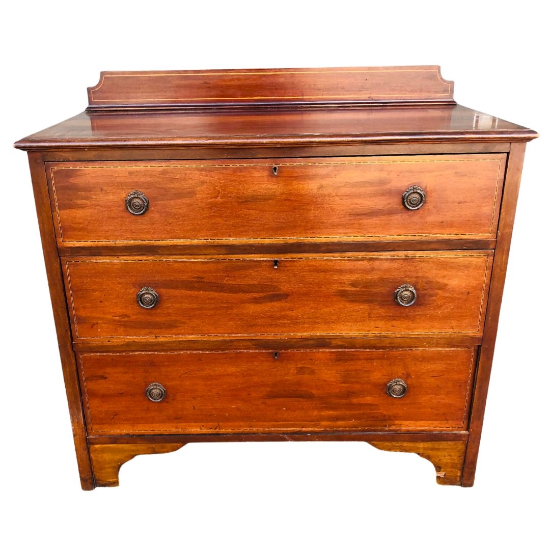 Edwardian Mahogany Chest of Drawers 3 long drawers and back rail. Boxwood and ebony inlay.  approx h