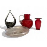 A collection of glass. Including cranberry jug & vase. Iridescent glass bowl and scandinavian centre