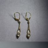 A pair of 9ct Gold ladies drop earrings. Stamped 375.  Length - 40mm 