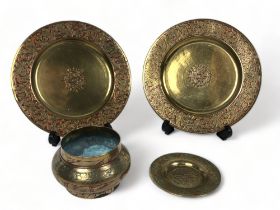 A collection of vintage Indian Kashmiri brass engraved & painted chargers & bowls.