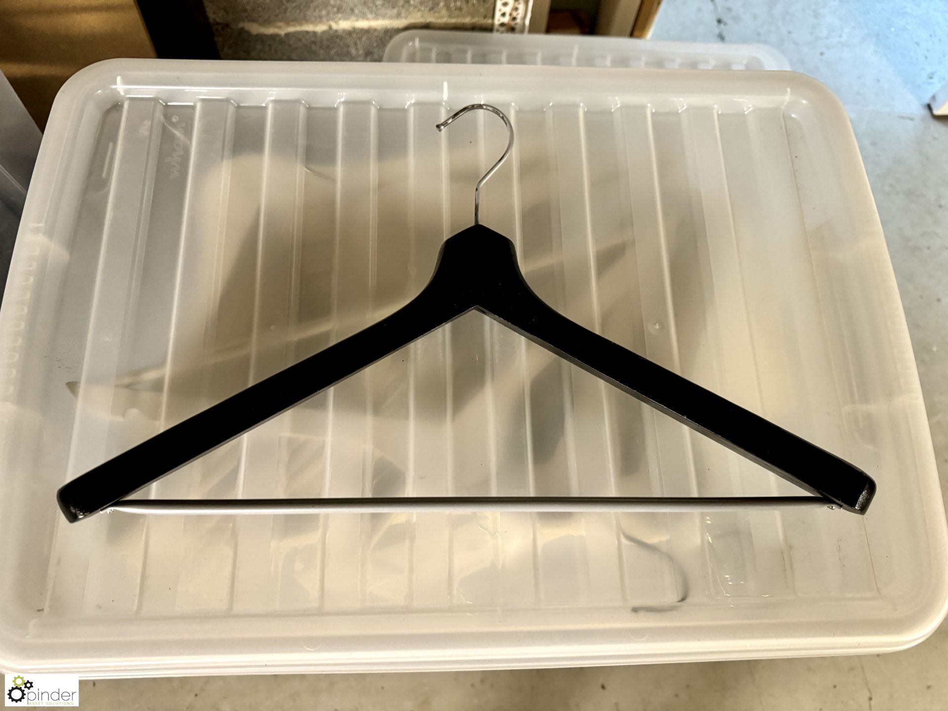 Quantity luxury wood Coat Hangers, including 4 plastic storage crates and lids