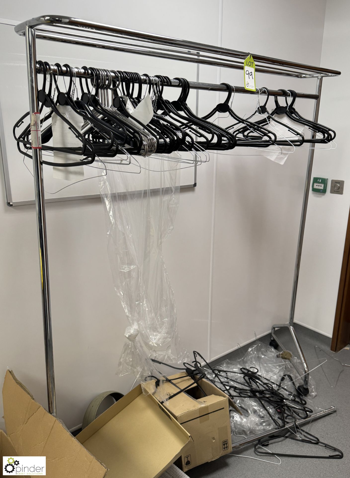 Tubular Coat Rack and quantity Coat Hangers (location in building – basement kitchen 2)