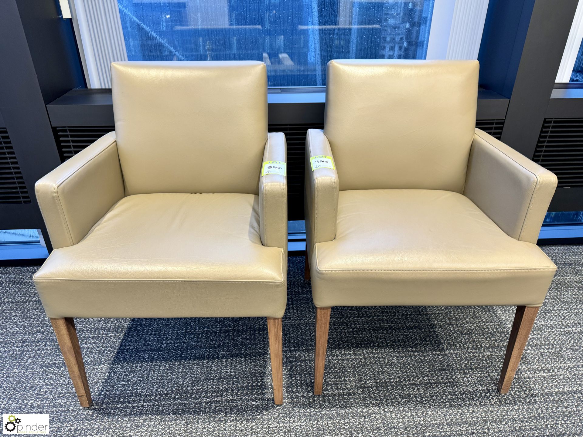 Pair leather Reception Armchairs (location in building – level 7)