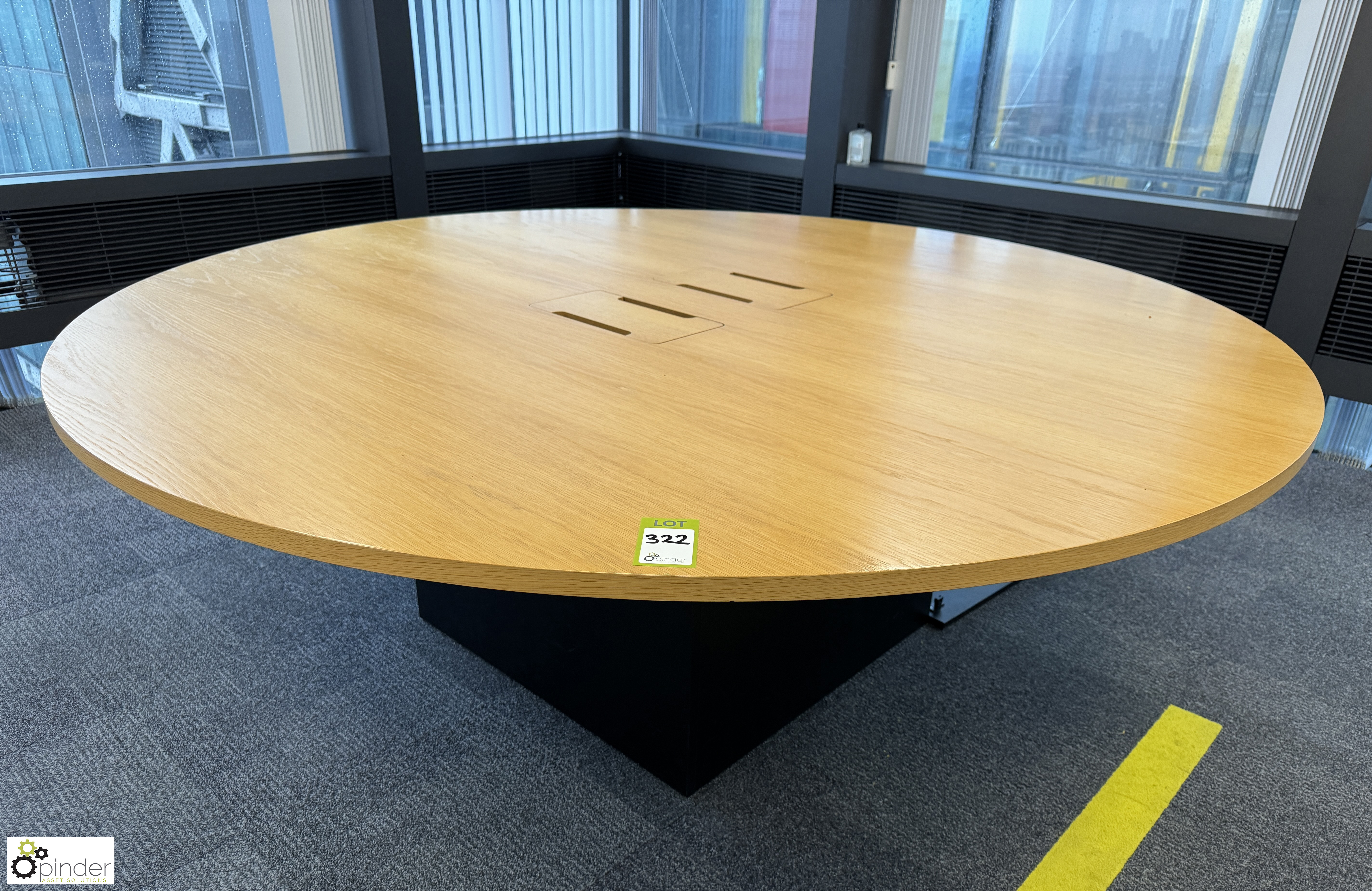 Light oak veneer circular Meeting Table, 2200mm x 750mm, with cable management and base (location in
