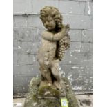 Reconstituted stone Figure Cherub with grapes, 910mm tall