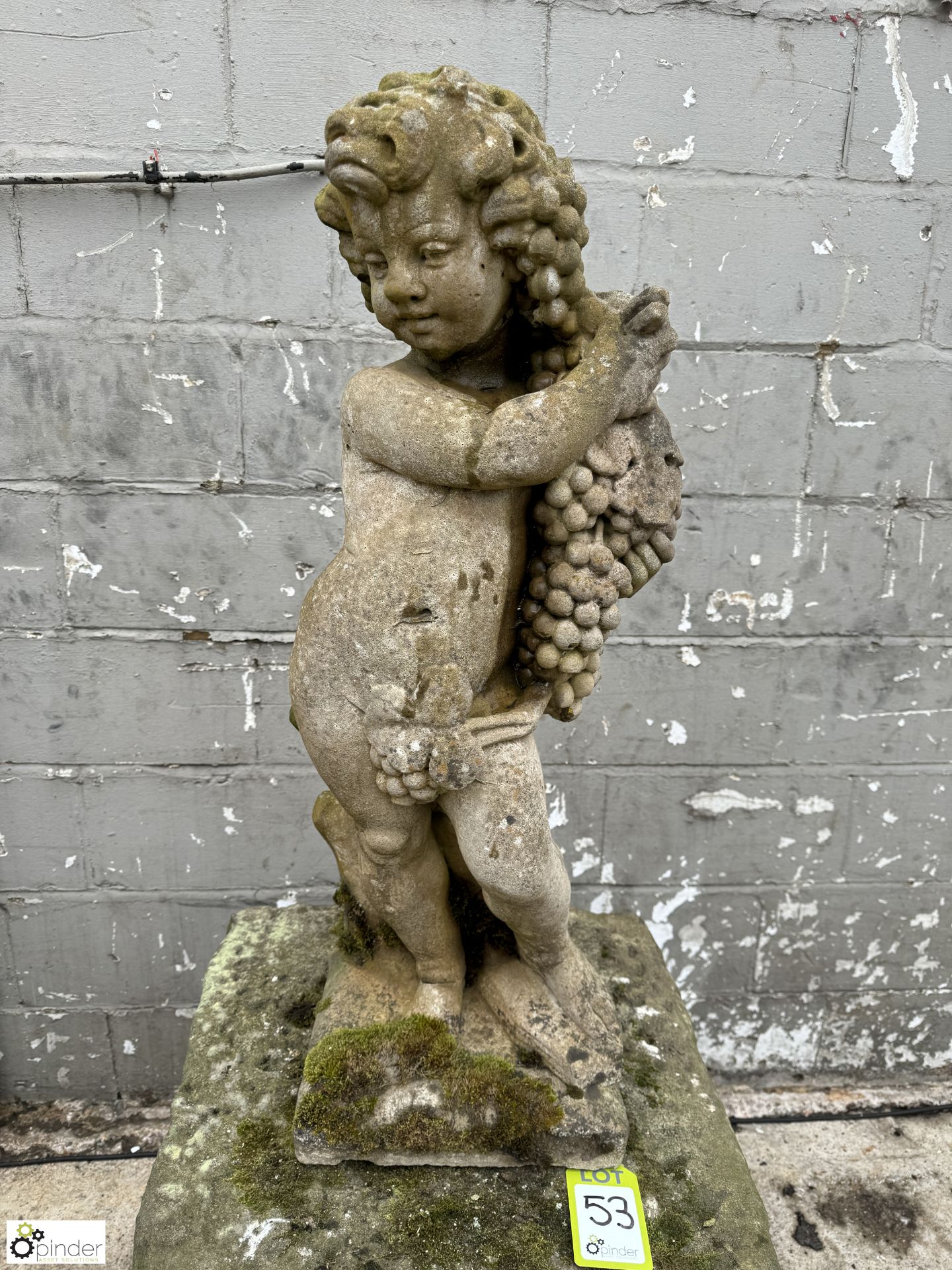 Reconstituted stone Figure Cherub with grapes, 910mm tall