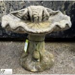 A reconstituted stone clam shell Birdbath, on tree trunk stand with rabbit decoration, approx.