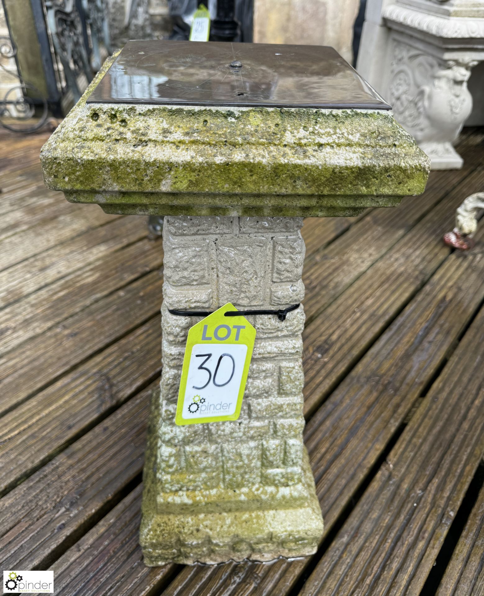 A reconstituted stone Balustrade with original bronze sundial plate, approx. 23in, circa mid to late