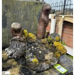 A reconstituted stone Water Feature depicting 2 otters and faux bois decoration, approx. 22in x