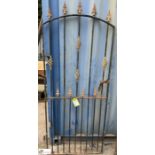 A wrought iron domed top Pedestrian Gate, with scr