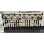 A pair wrought iron Pedestrian Gates, with scroll work decoration, each one is approx. 36in x 36in