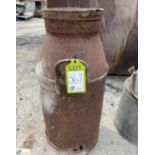 An original iron Milk Churn, marked "C W S" (coope