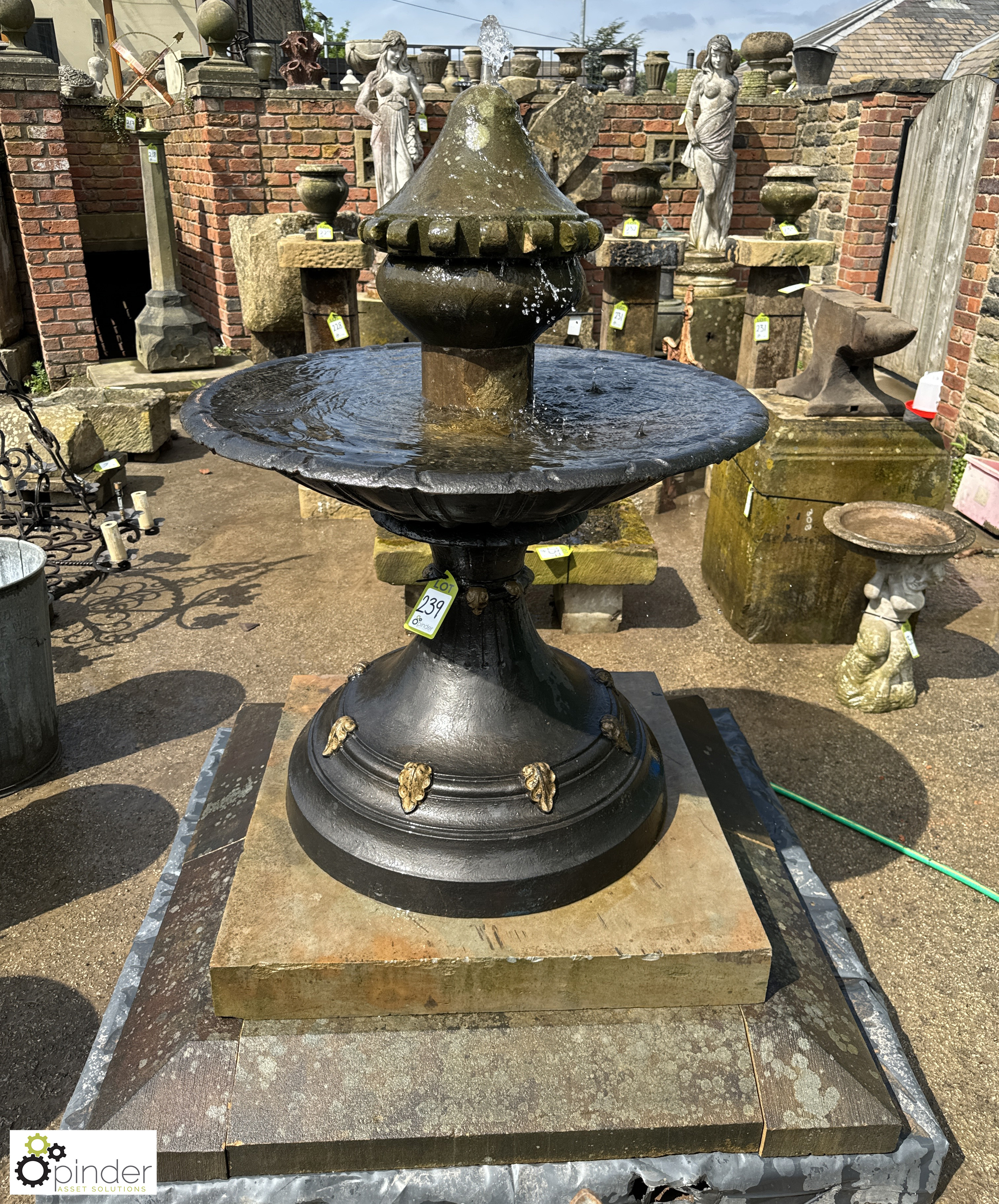 A Victorian cast iron Base and Fountain Bowl, on 2-tier Yorkshire stone plinth, with a carved