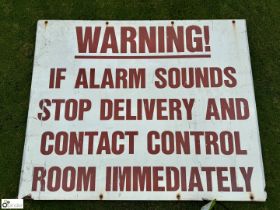 A vintage Sign "Warning if an alarm sounds, stop d