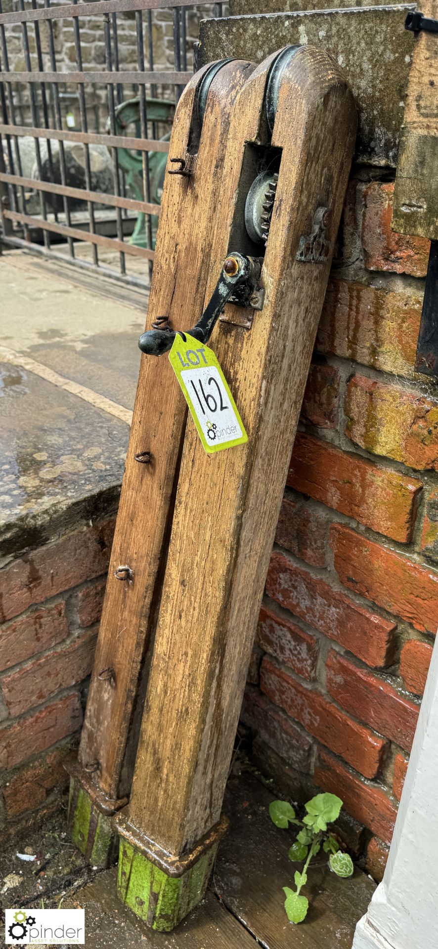 A pair antique wooden and cast iron Tennis Posts, with bronze winding gear, approx. 42in, circa