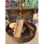 A round wrought iron Firepit, with 2 wrought iron lifting handles, approx. 4in x 19in diameter