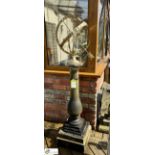 A Yorkshire stone Balustrade Plinth, with decorative bronze armillary, approx. 68in