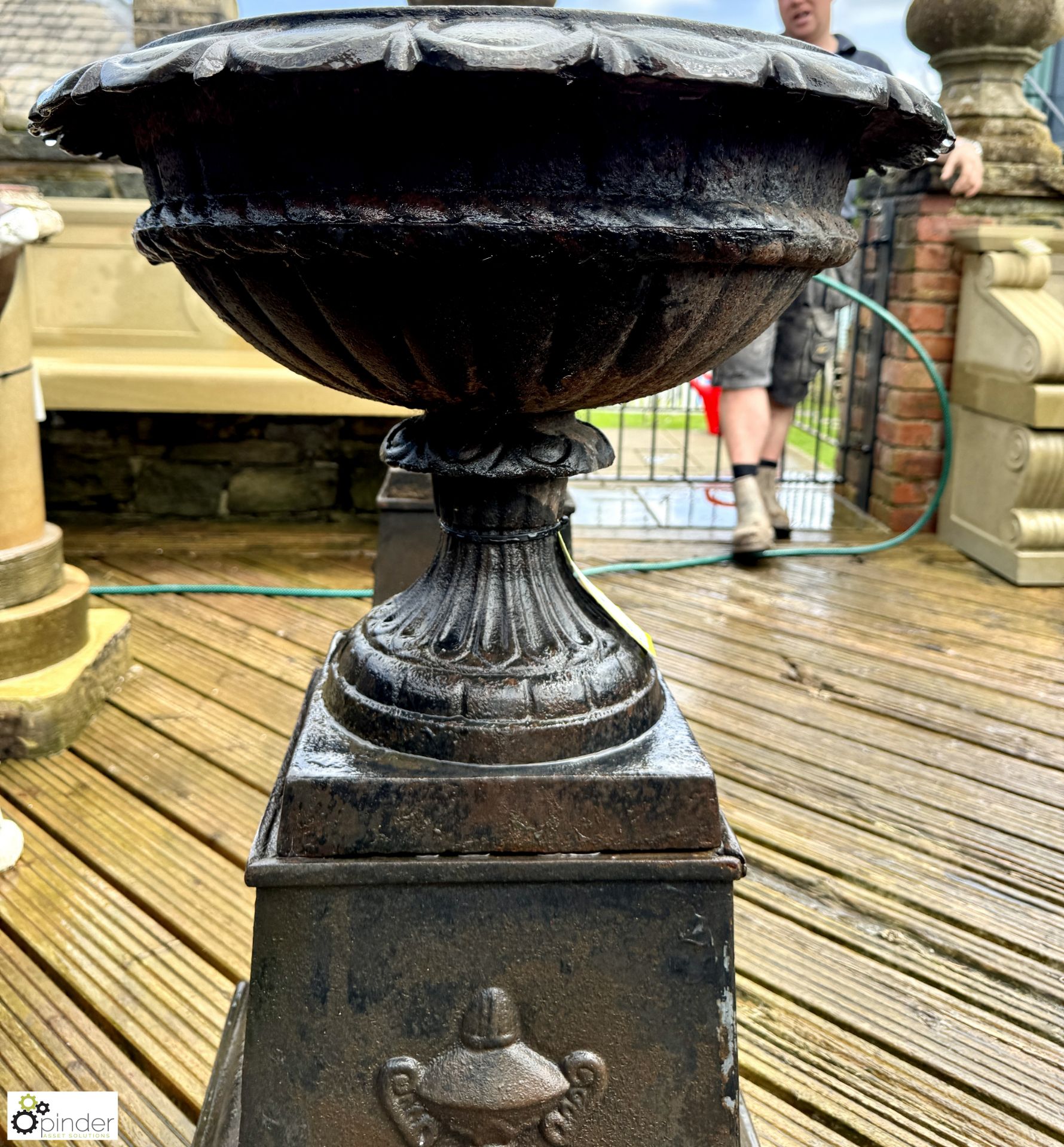 A pair cast iron Garden Urns, with egg and dart decoration on cast iron plinths, with fruit and swag - Image 5 of 10