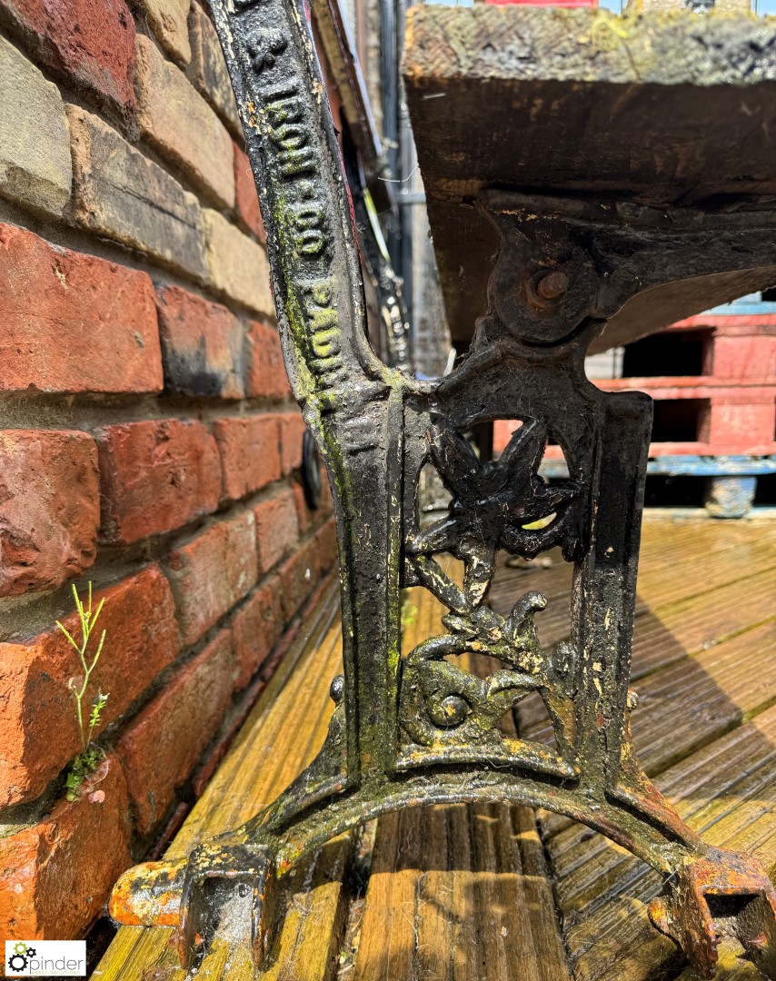 A decorative wrought iron folding Theatre Bench, makers mark “Unity Wood & Iron Company Padiham”, - Image 4 of 7