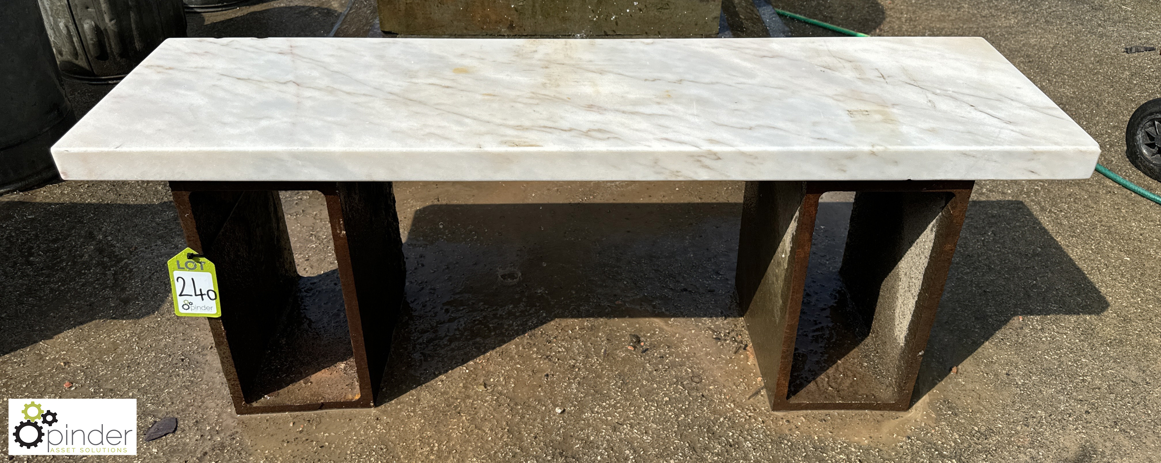 A contemporary cast iron and Italian marble Garden Bench, comprising 2 antique cast iron legs and