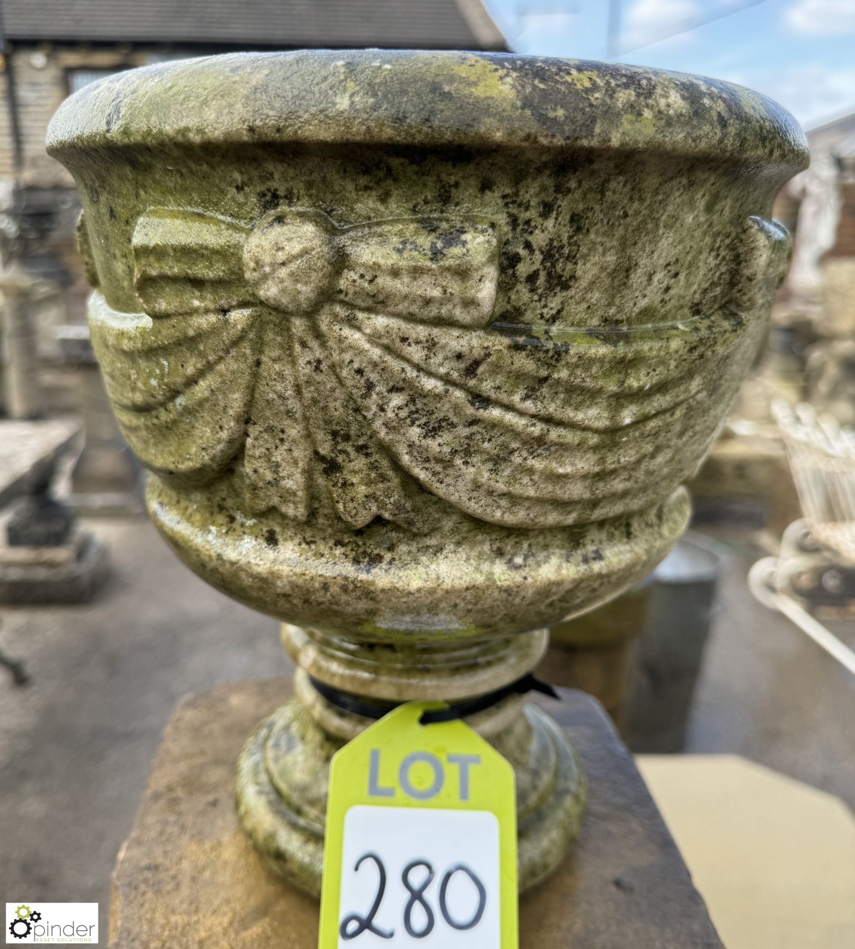 A statuary white marble Garden Urn, with bow and swag decoration, approx. 11in x 10in diameter,