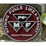 A round cast iron Massey Ferguson Sign “Nothing pulls like a Massey”, approx. 9in diameter