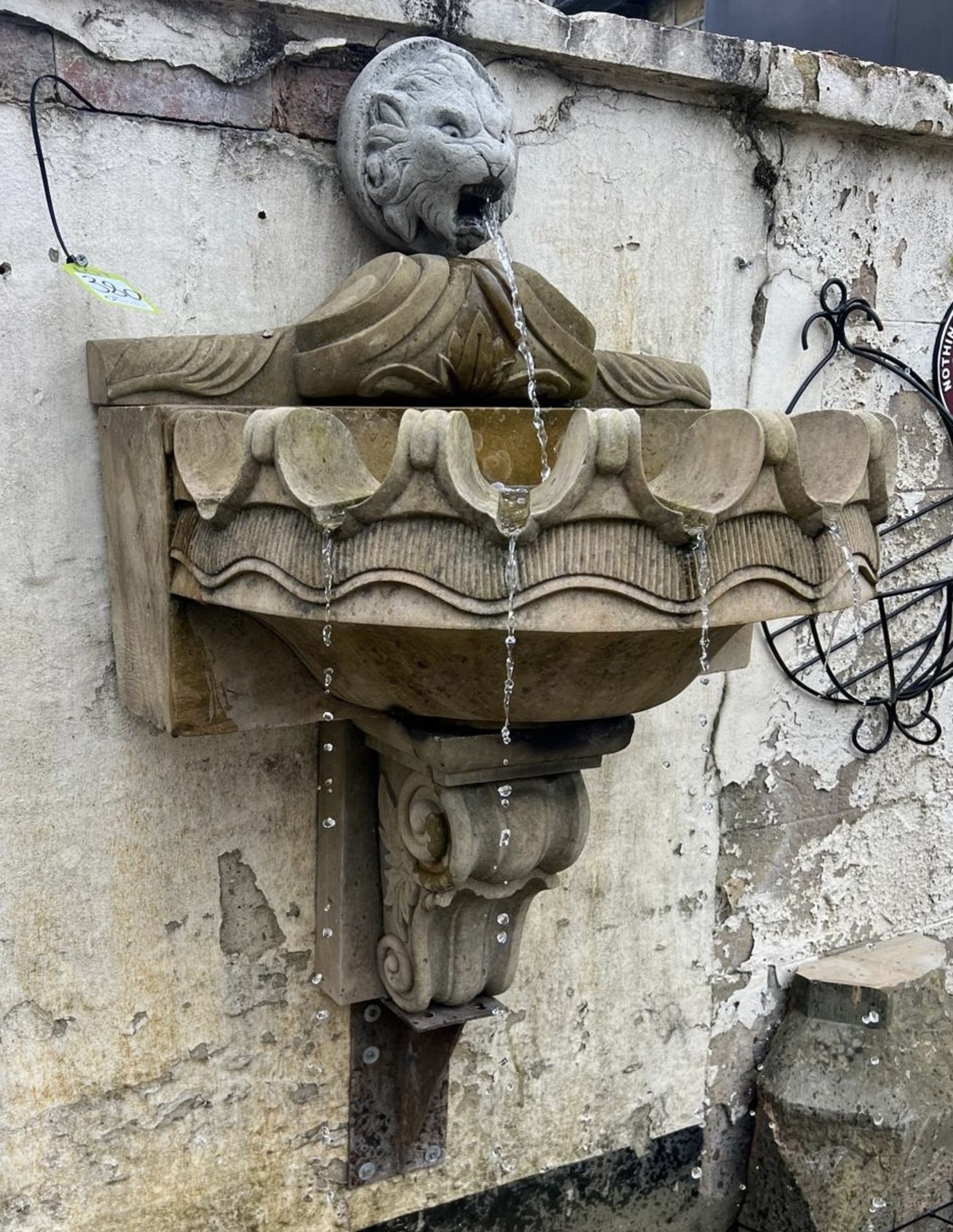 A Wall Fountain comprising reconstituted stone lions head waterspout, mounted above a sandstone clam - Image 3 of 13