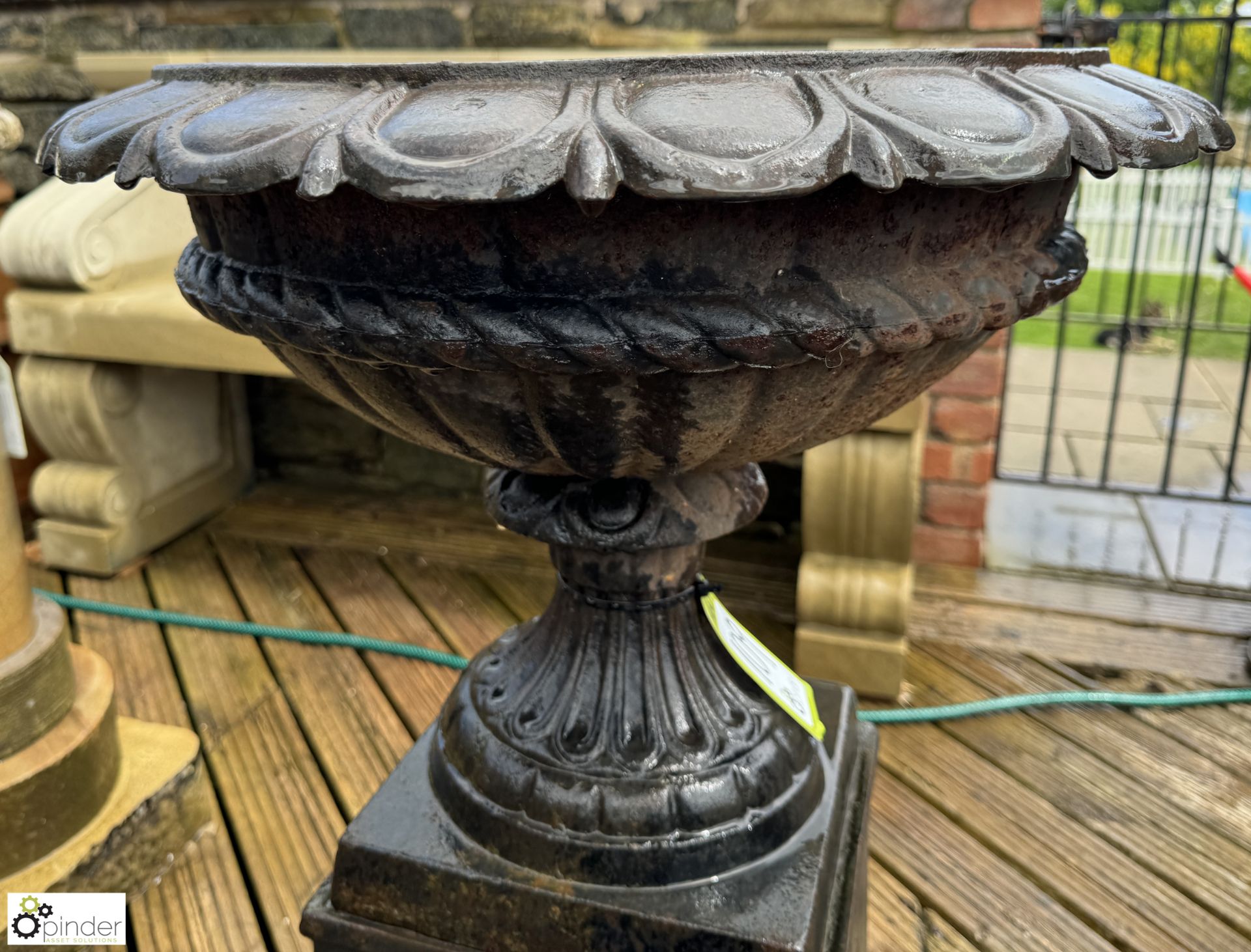A pair cast iron Garden Urns, with egg and dart decoration on cast iron plinths, with fruit and swag - Image 8 of 10