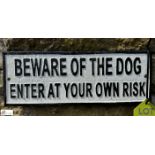 A cast iron Sign “Beware of the Dog Enter at Owner’s Risk”, approx. 5in x 14in long