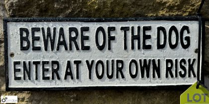 A cast iron Sign “Beware of the Dog Enter at Owner’s Risk”, approx. 5in x 14in long