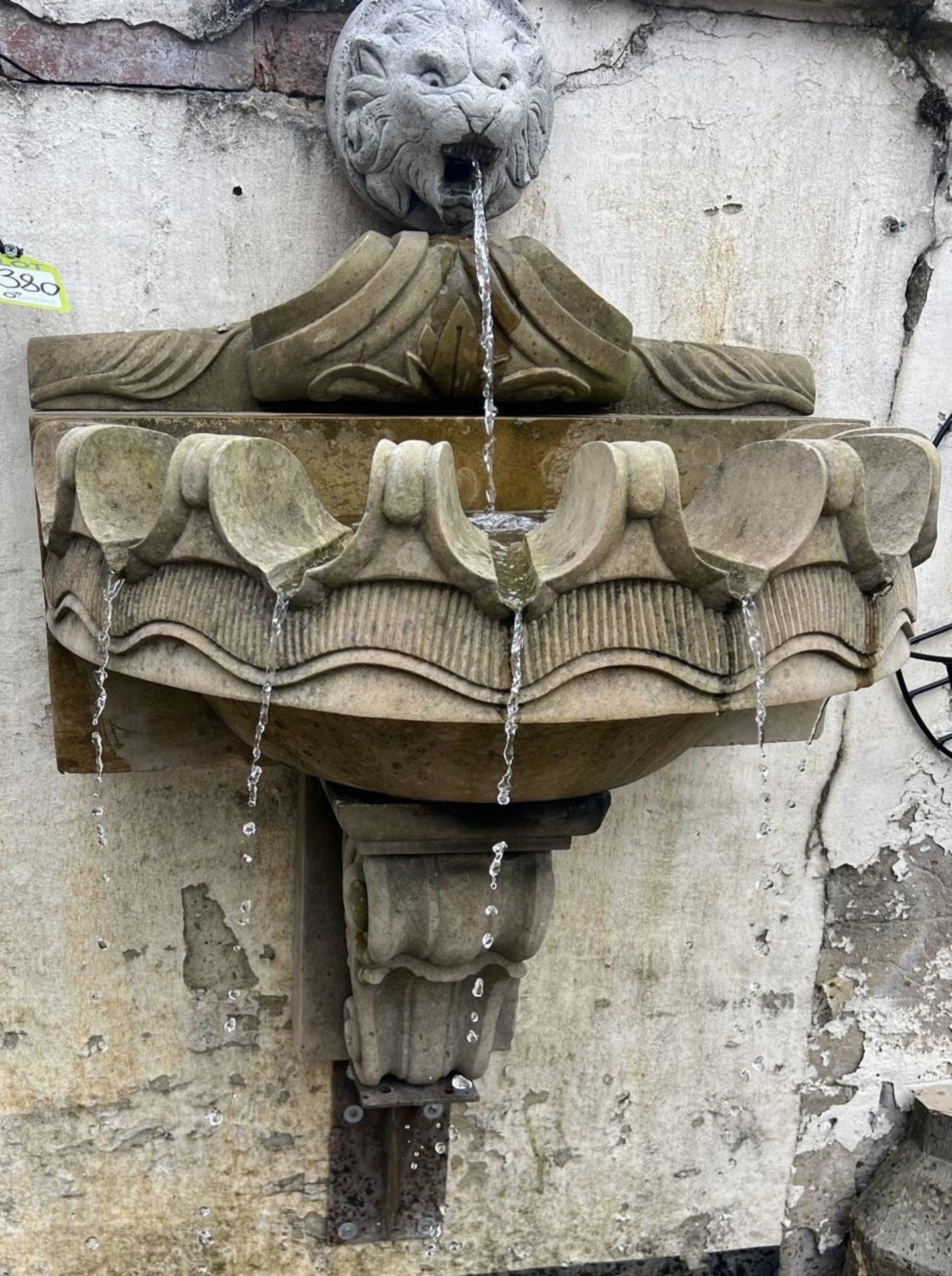 A Wall Fountain comprising reconstituted stone lions head waterspout, mounted above a sandstone clam - Image 4 of 13