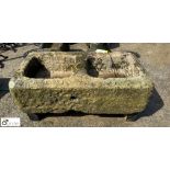 A Yorkshire gritstone double ended Feed Trough, approx. 18in x 38in x 14in, circa 17th century