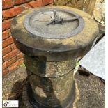 An original Birdbath and Sundial, decorative gnomon of a young boy fishing on a pier, with Roman