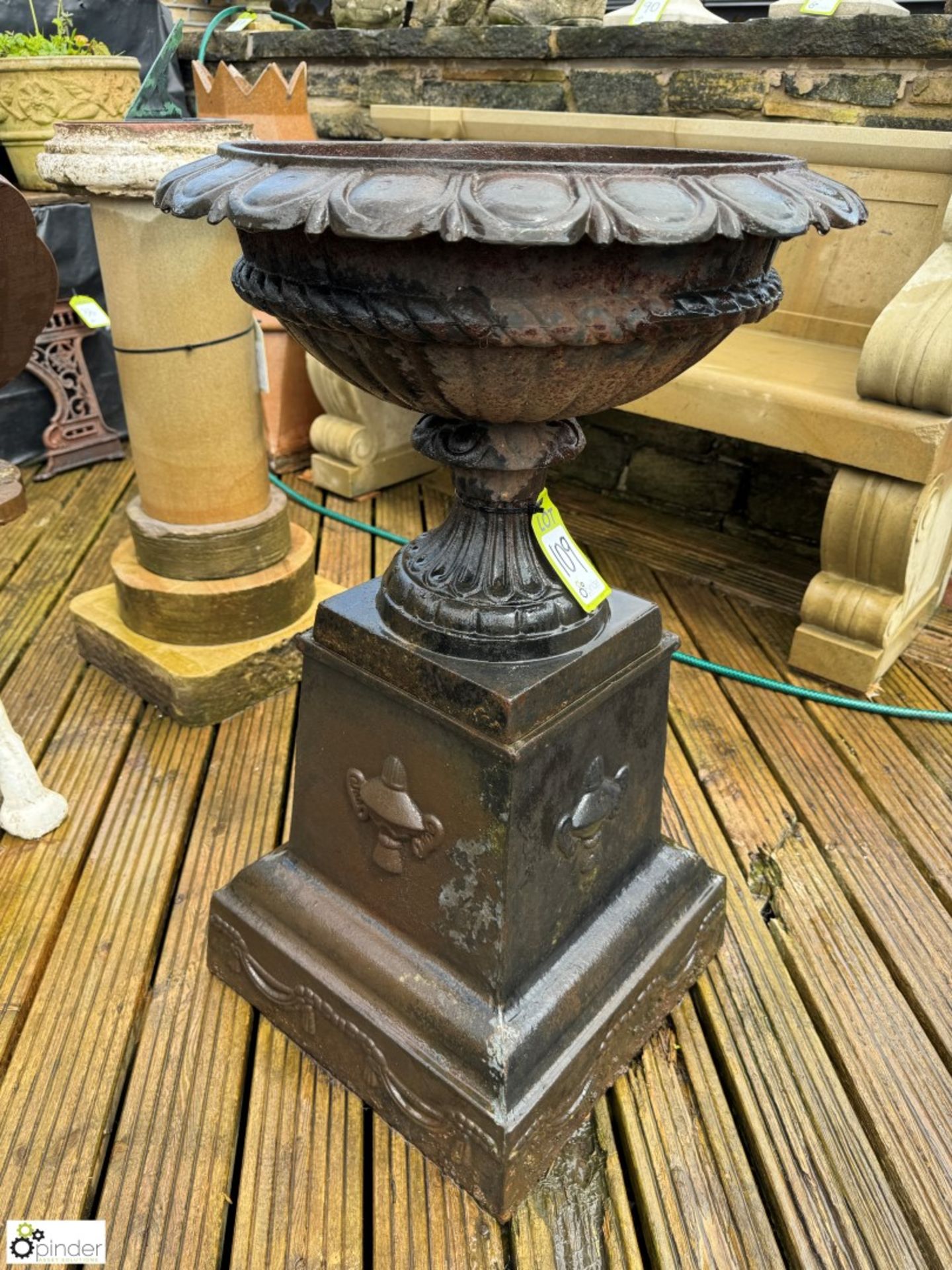 A pair cast iron Garden Urns, with egg and dart decoration on cast iron plinths, with fruit and swag - Image 7 of 10