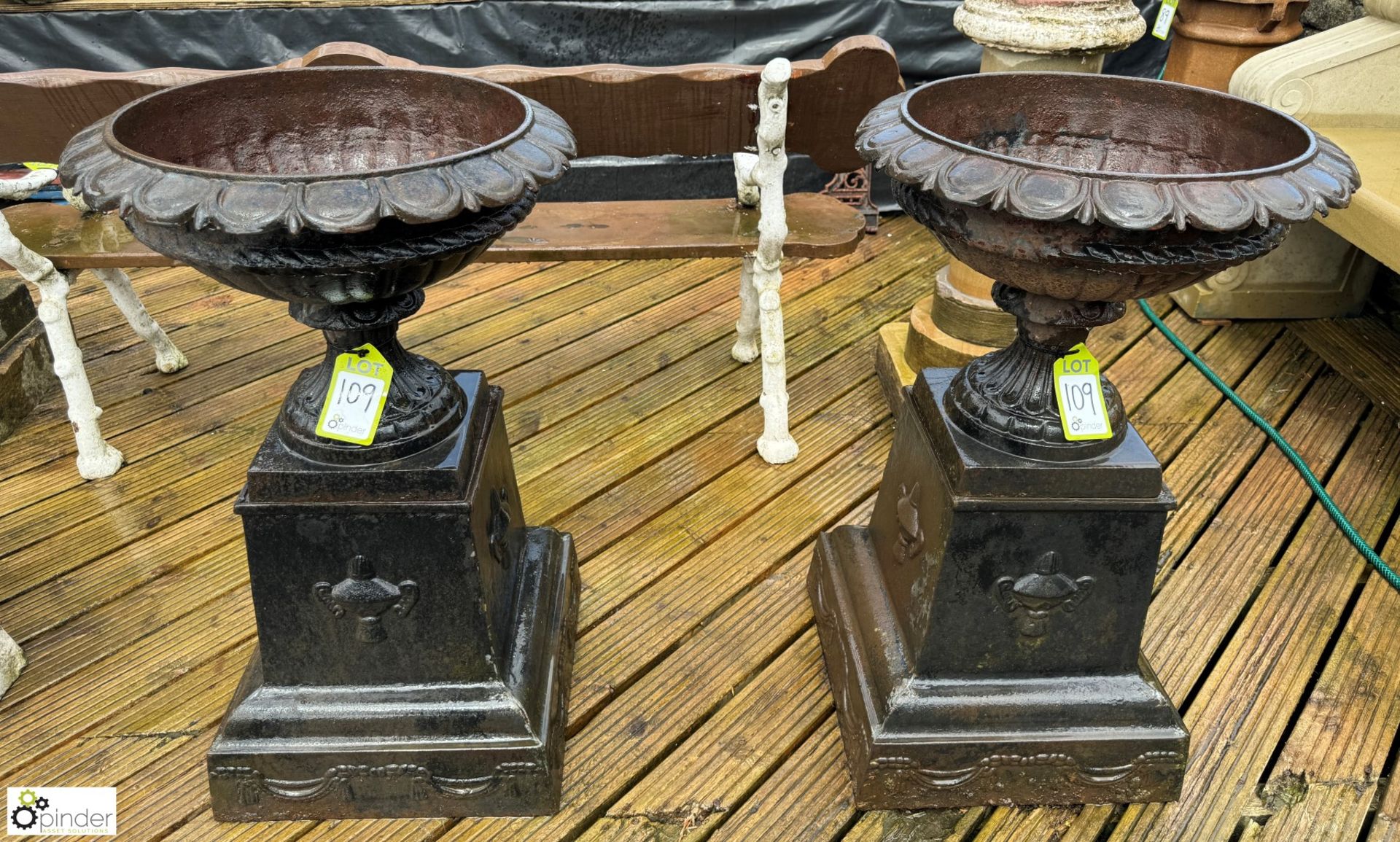 A pair cast iron Garden Urns, with egg and dart decoration on cast iron plinths, with fruit and swag - Image 2 of 10