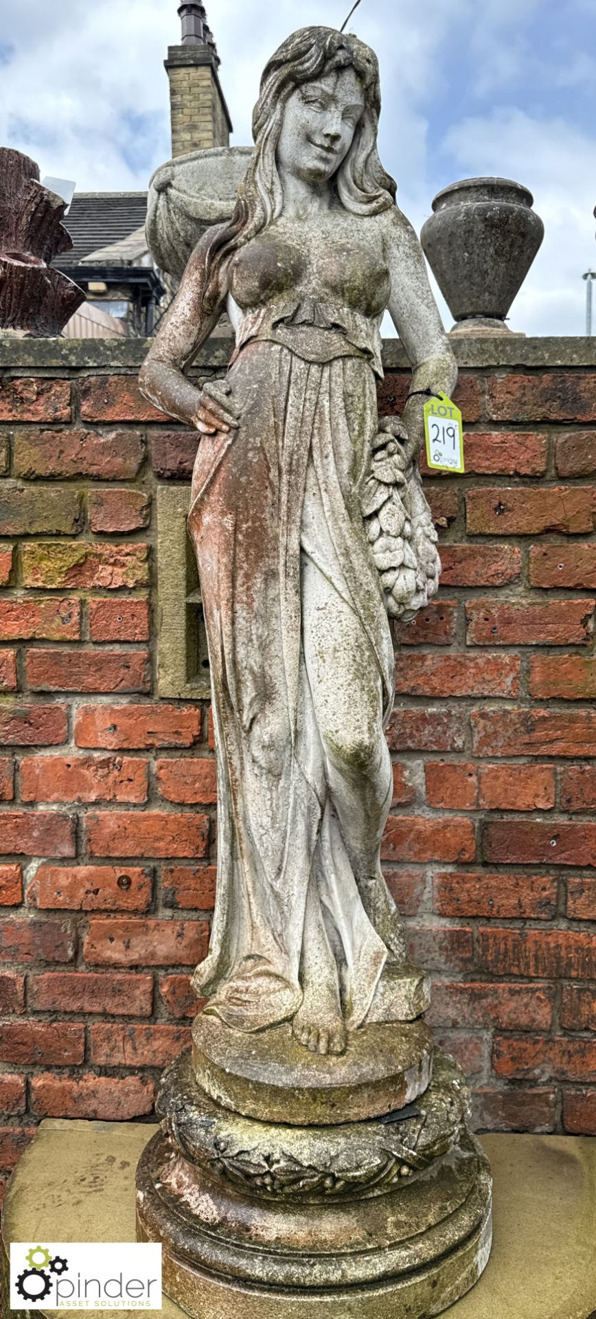 A reconstituted classical marble Statue, depicting young lady carrying a laurel wreath, statue stood