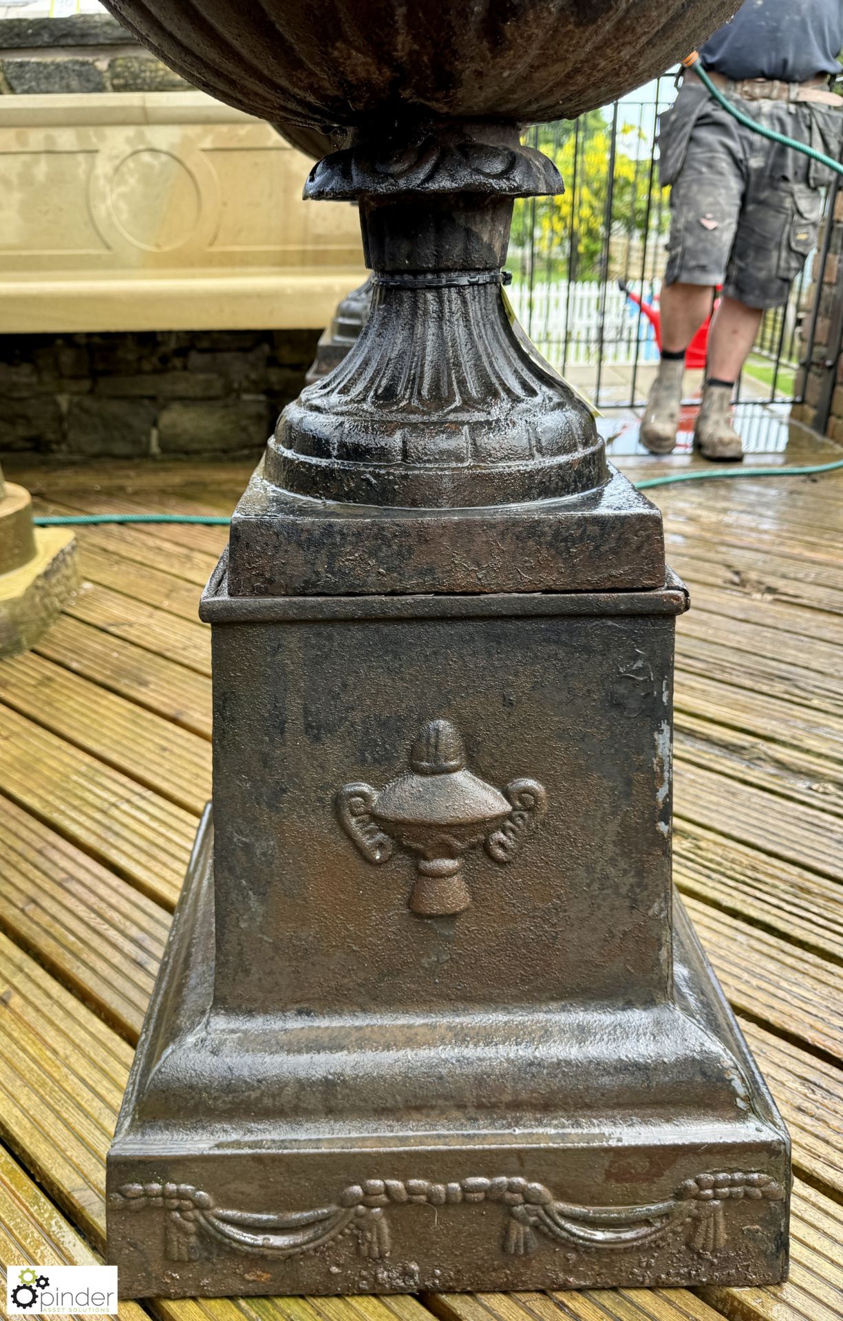 A pair cast iron Garden Urns, with egg and dart decoration on cast iron plinths, with fruit and swag - Image 6 of 10