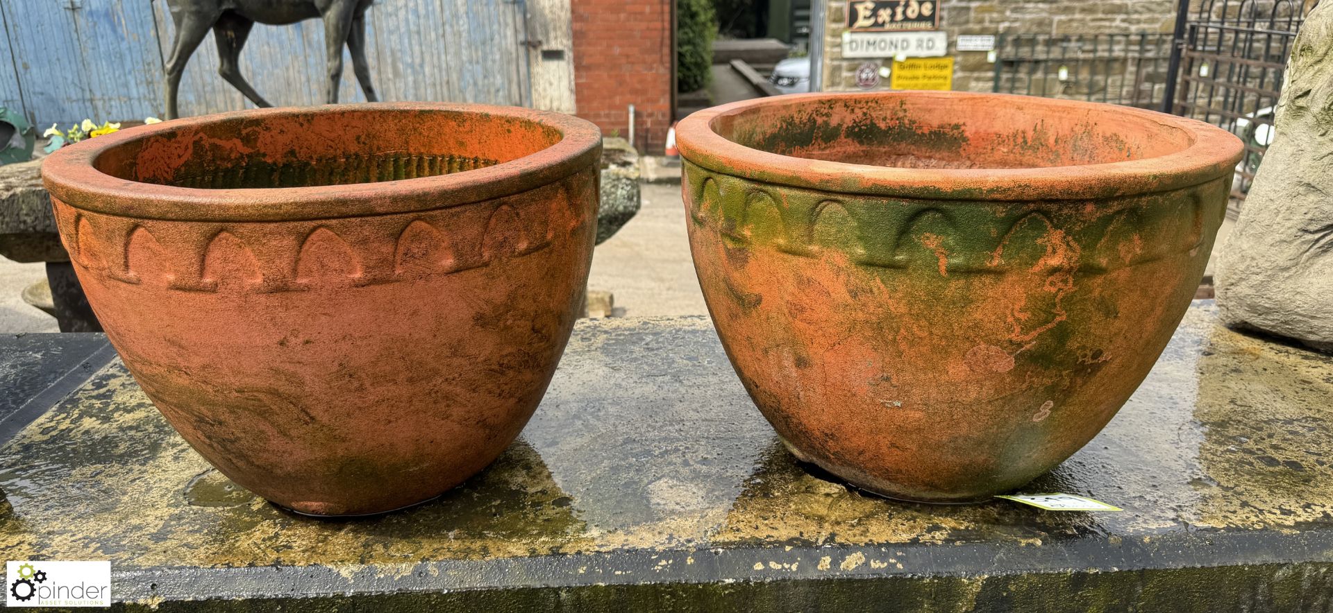 A pair large terracotta Planters, with arrowhead decoration, approx. 12.5in x 19in diameter, circa
