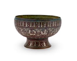 A SILVER-INLAID WHITE BRONZE FOOTED BOWL, IRAN, PROBABLY KHORASSAN, EARLY 13TH CENTURY