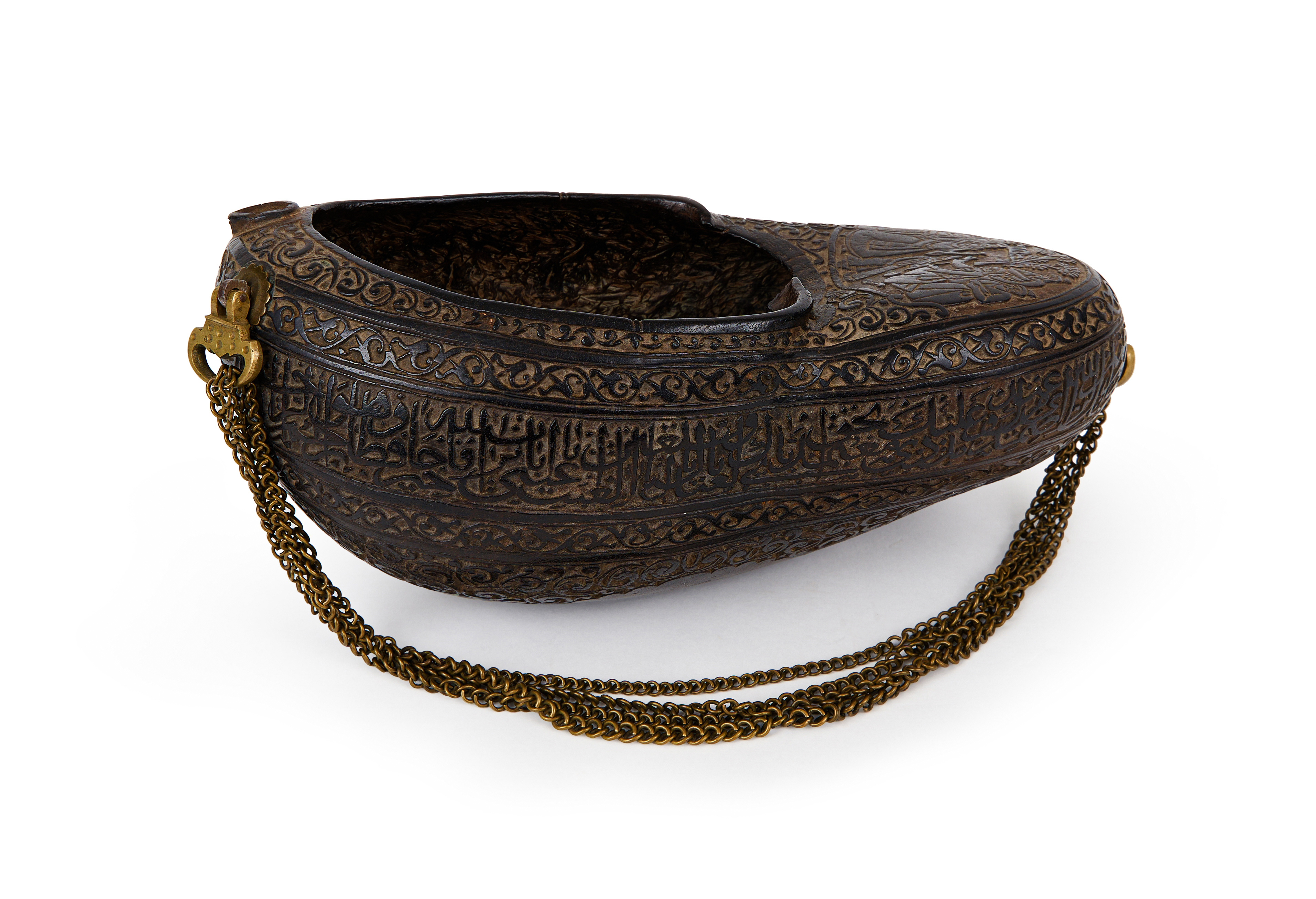 A QAJAR COCO-DE-MER BEGGAR'S BOWL (KASHKUL) 19TH CENTURY OR EARLIER