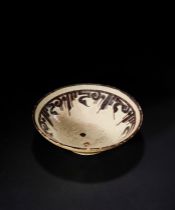 A NISHAPUR CALLIGRAPHIC POTTERY BOWL, EASTERN PERSIA, 10TH CENTURY