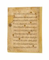 A LARGE FATIMID QURAN LEAF, 9TH-10TH CENTURY, EGYPT