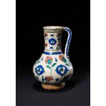 AN IZNIK CINTAMANI POTTERY JUG, TURKEY, CIRCA 1570