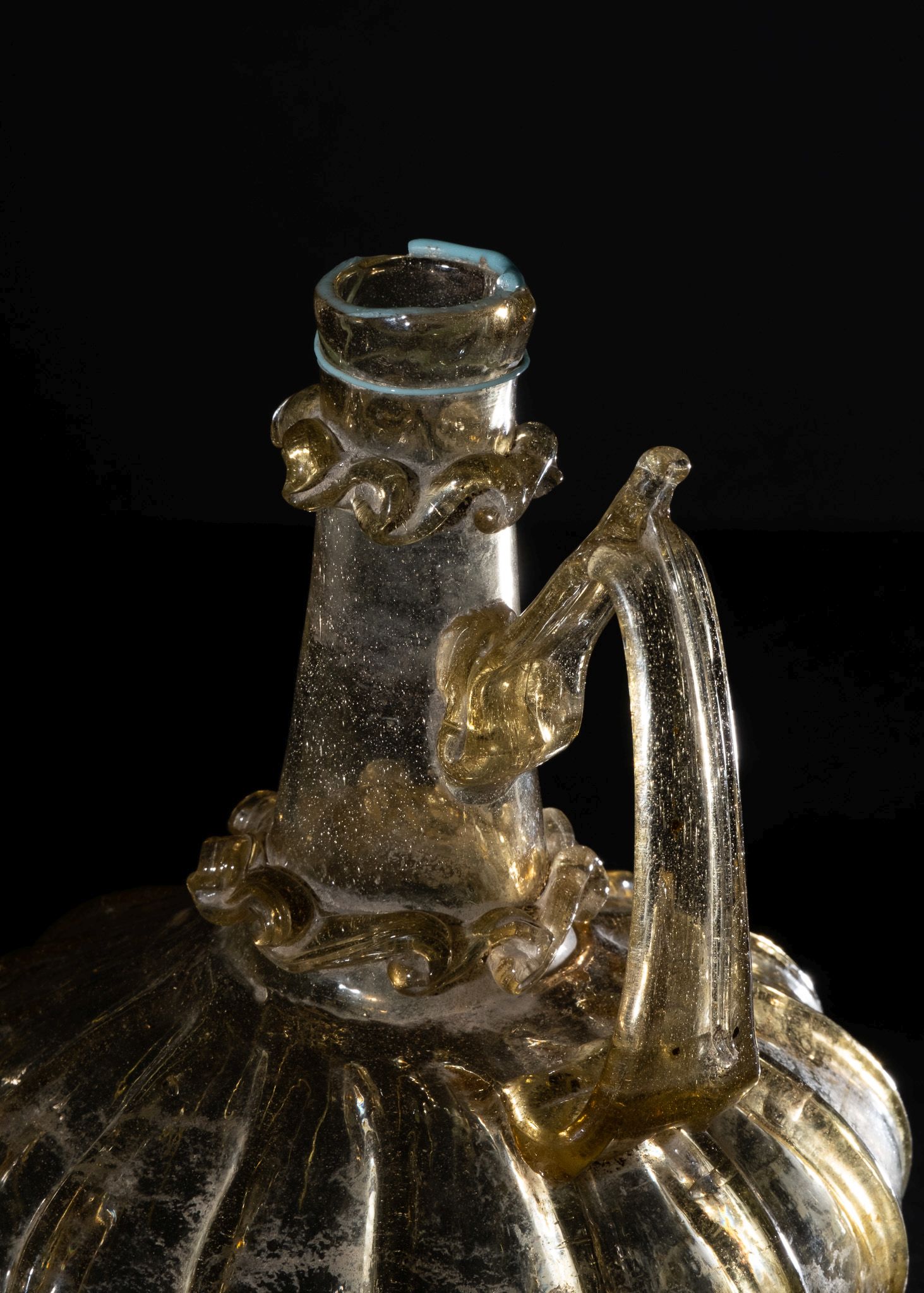 A HIGHLY RARE FATIMID FLUTED YELLOW GLASS EWER, CIRCA 10TH CENTURY, EGYPT - Image 2 of 2