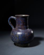 AN EARLY IZNIK BLUE POTTERY JUG, CIRCA 1570, 16TH CENTURY, OTTOMAN, TURKEY